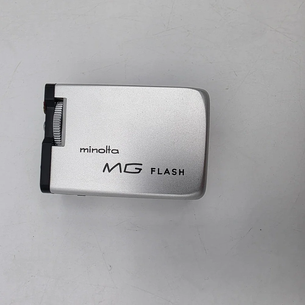 Minolta-16 MG Film Camera and‎ MG Flash Leather Holder Case and Metal Lanyard